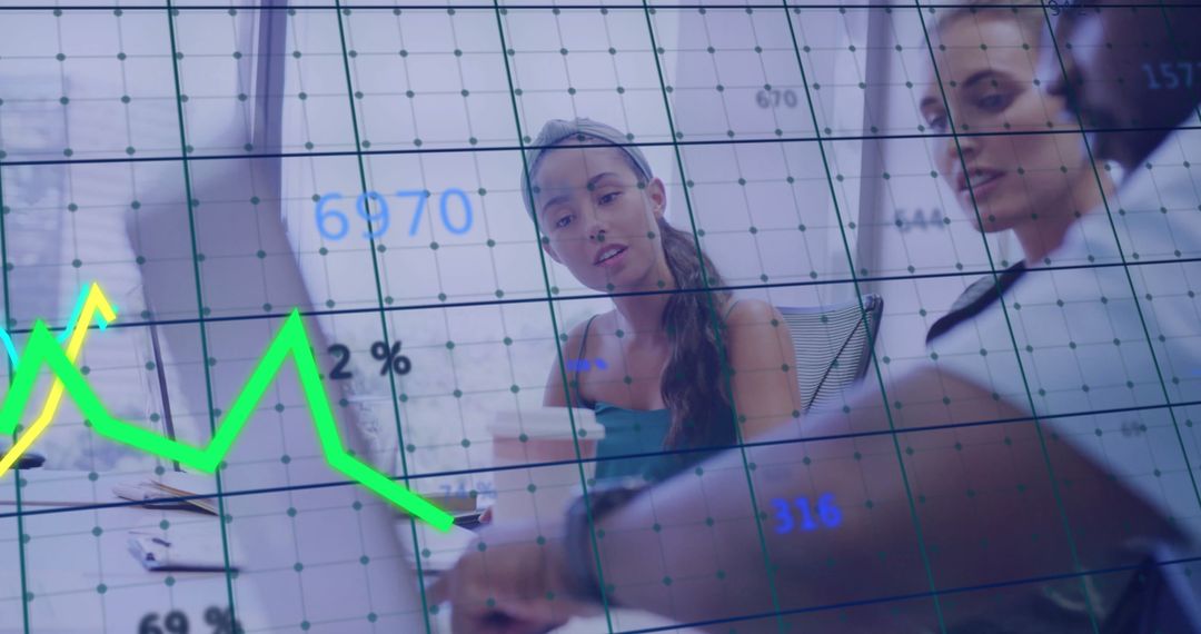 Business Meeting Analyzing Financial Data and Charts