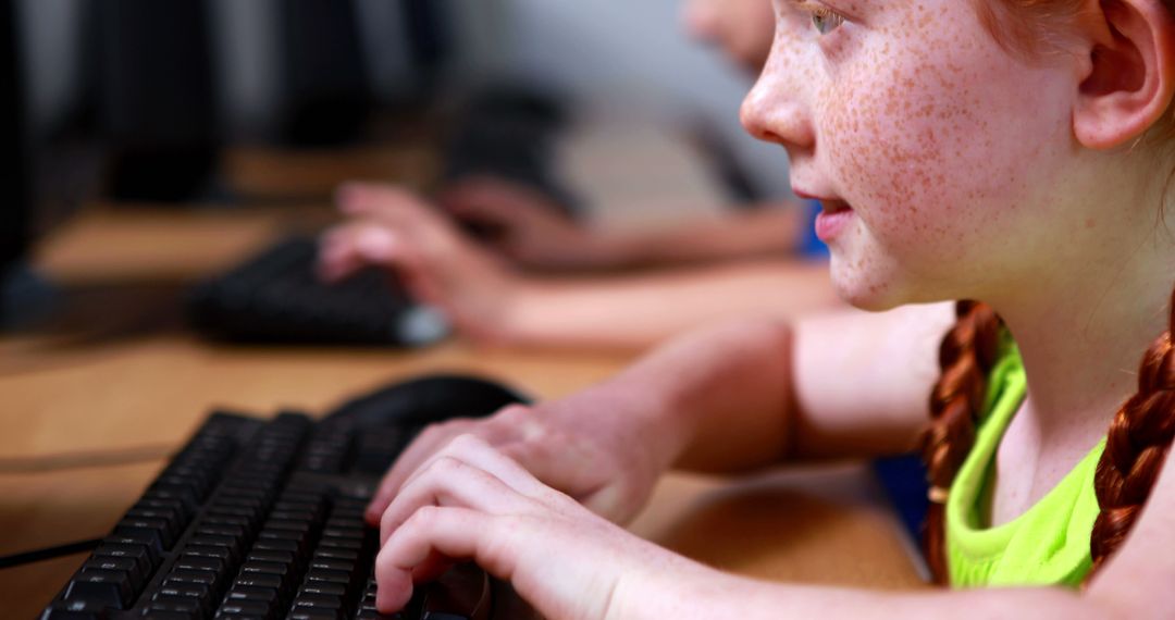 Young Girl Actively Learning on Computers at School - Free Images, Stock Photos and Pictures on Pikwizard.com