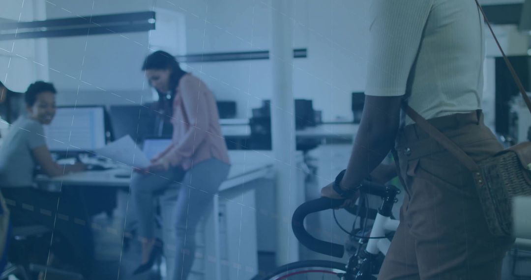Bicycle Commuter Entering Dynamic Modern Office Workspace