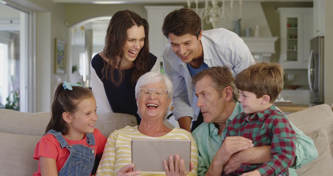 Multigenerational Family Enjoying Digital Tablet Together - Free Images, Stock Photos and Pictures on Pikwizard.com