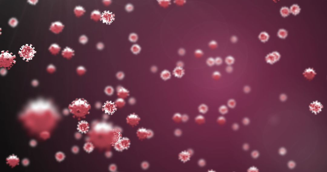 Macro View of COVID-19 Cells Against Red Background