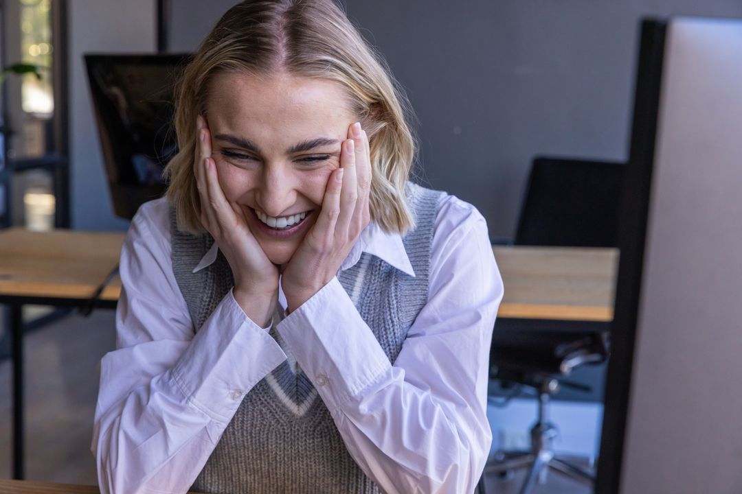 Joyful Professional in Modern Office Setting