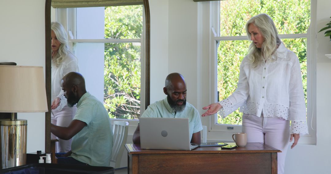 Couple Balancing Work and Home Life in Modern Space