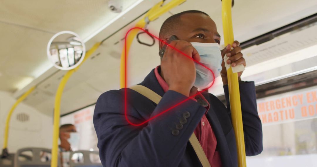 Professional Man Wearing Mask on Public Transport Using Smartphone