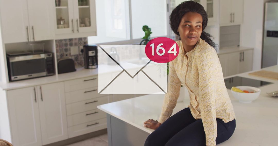 Woman Relaxing on Modern Kitchen Island with Digital Notification