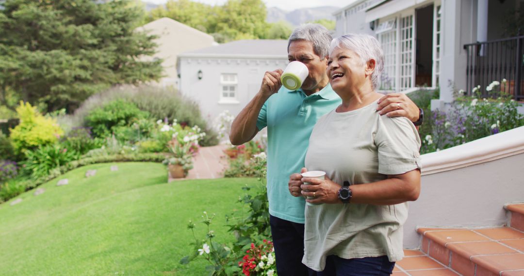 Image of relaxed biracial senior couple drinking coffee in garden - Free Images, Stock Photos and Pictures on Pikwizard.com