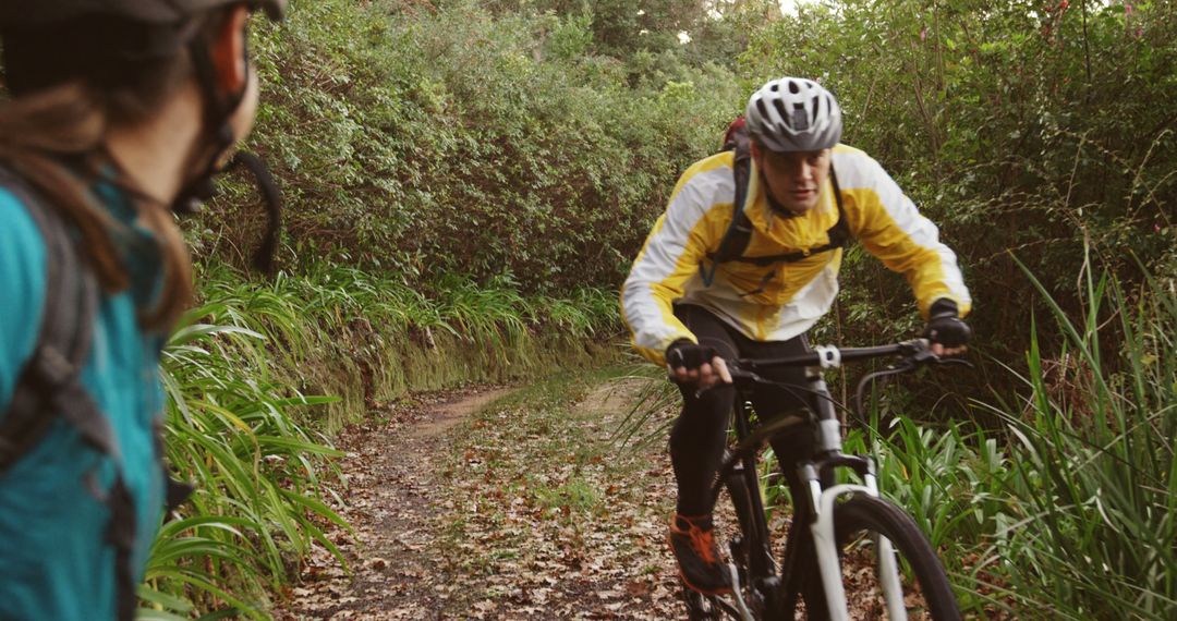 Mountain Bikers Riding Through Forest Trail - Free Images, Stock Photos and Pictures on Pikwizard.com