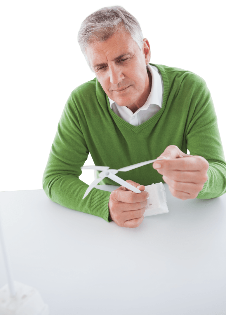 Middle-aged Man Examining Windmill Architecture Model Transparent