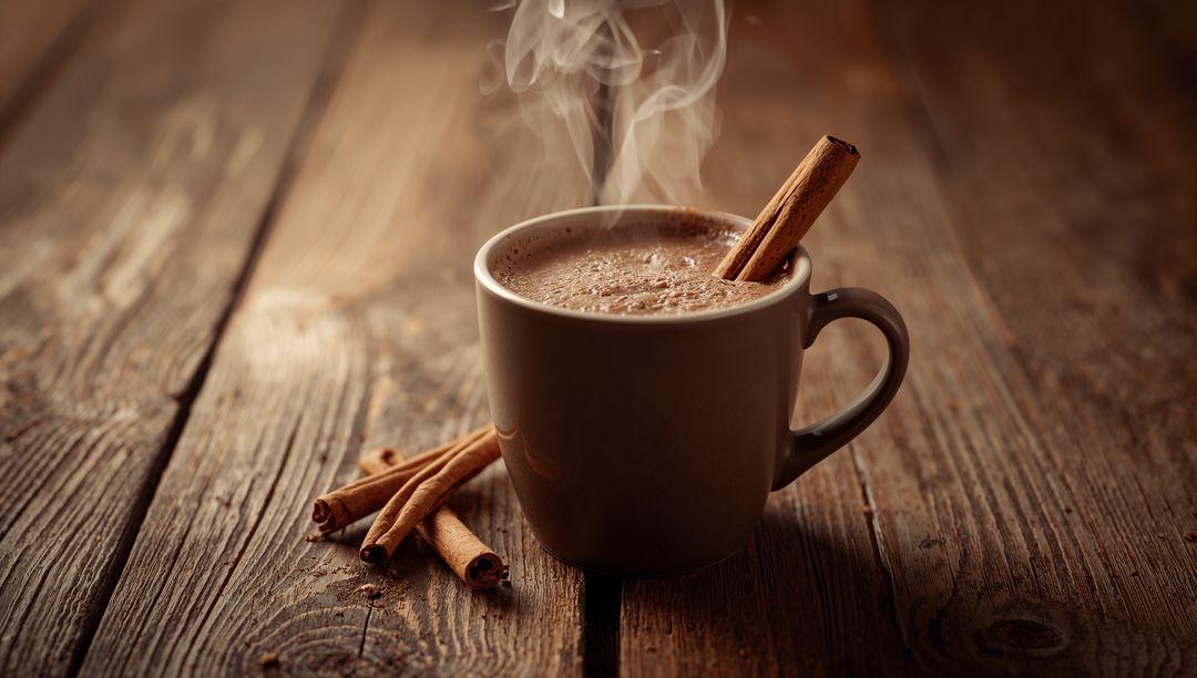 Steaming Hot Beverage in Rustic Mug with Cinnamon