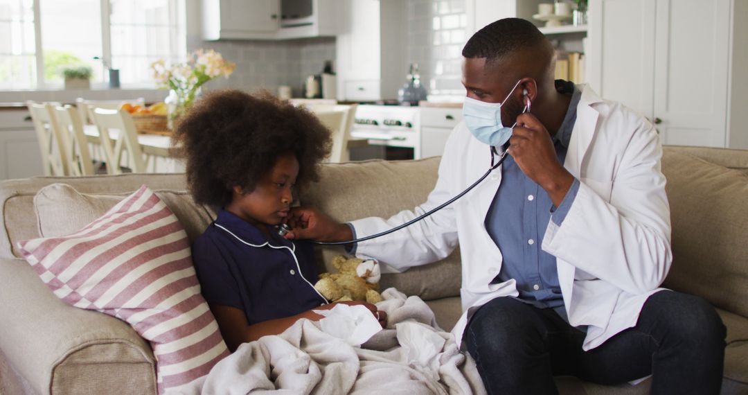 Doctor Checking Young Patient's Heartbeat at Home - Free Images, Stock Photos and Pictures on Pikwizard.com