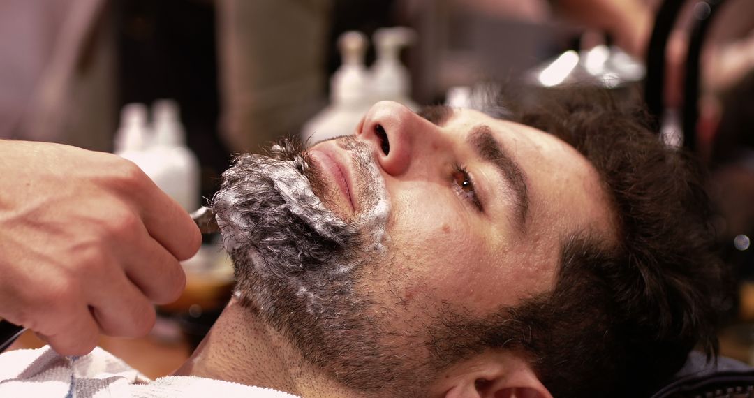 Man Getting Beard Trimmed at Barber Shop - Free Images, Stock Photos and Pictures on Pikwizard.com