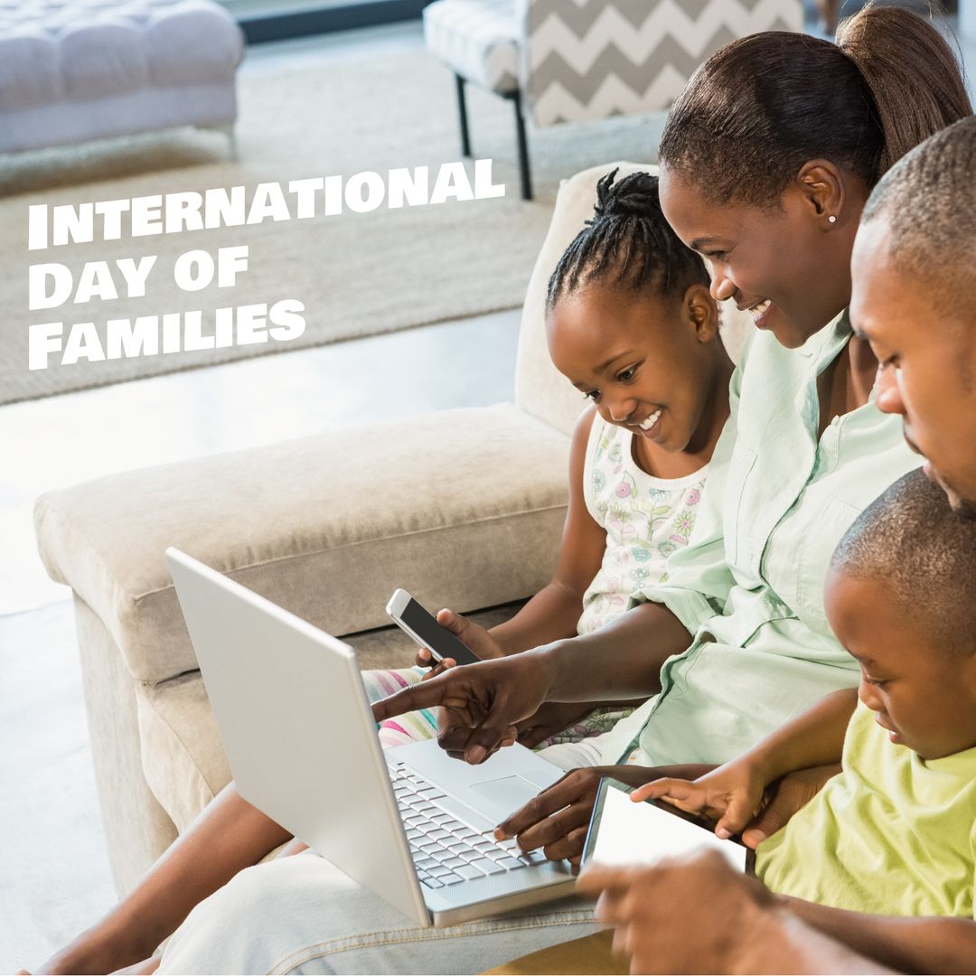 Happy African American Family Connecting on Devices at Home
