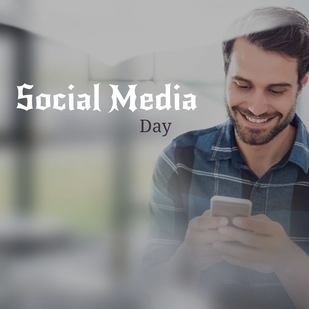 Social Media Day Celebration: Smiling Young Man Using Smartphone