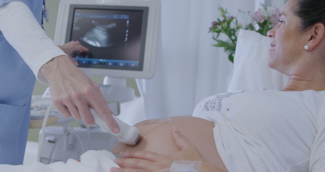 Pregnant Woman Having Ultrasound Examination in Hospital - Free Images, Stock Photos and Pictures on Pikwizard.com