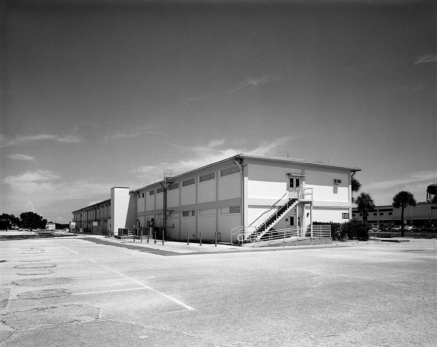 Exterior View of Large Industrial Building on Clear Day