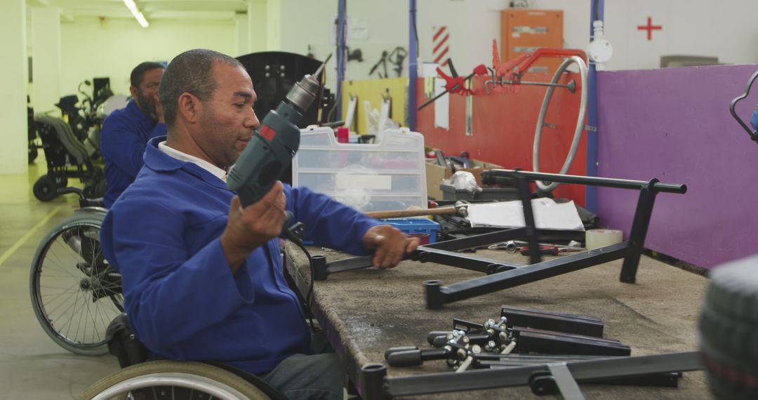 Disabled Worker Assembling Metal Components in Workshop - Free Images, Stock Photos and Pictures on Pikwizard.com