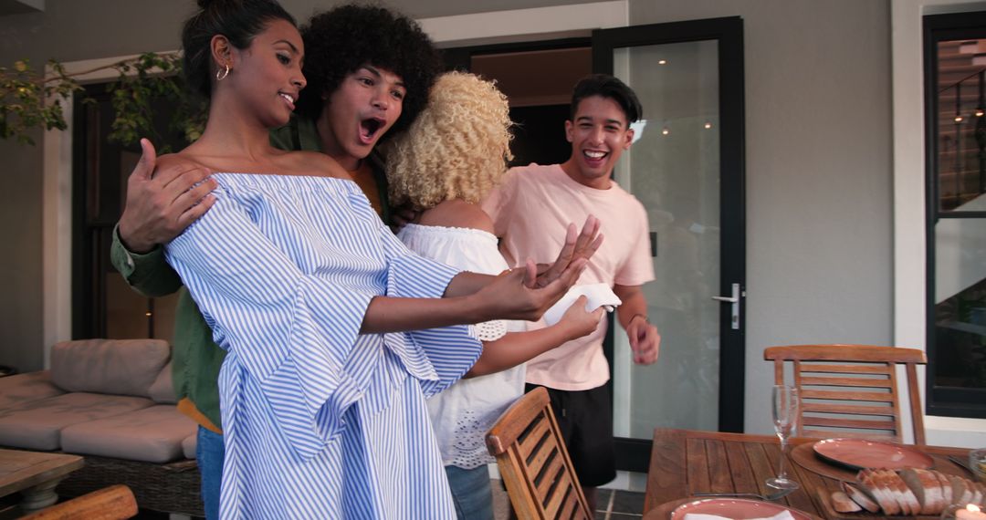 Diverse Friends Celebrating Engagement Showing Ring Outdoors