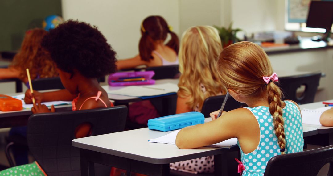 School Children Studying in Classroom with Focused Attendance