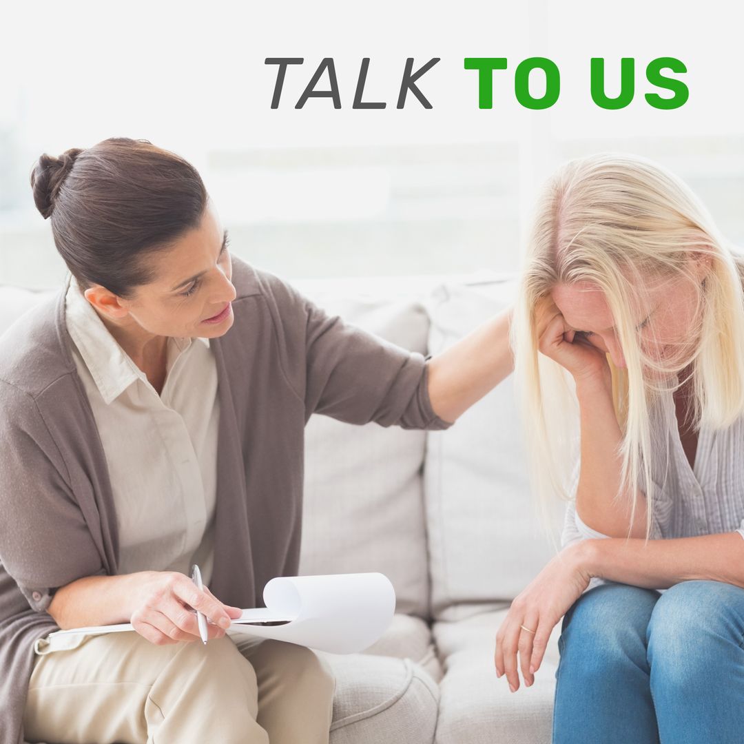 Caring Therapist Supporting Upset Client in Counseling Session