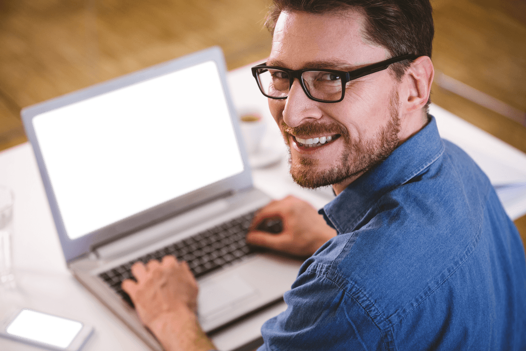 Smiling Man in Office with Laptop Transparent Background