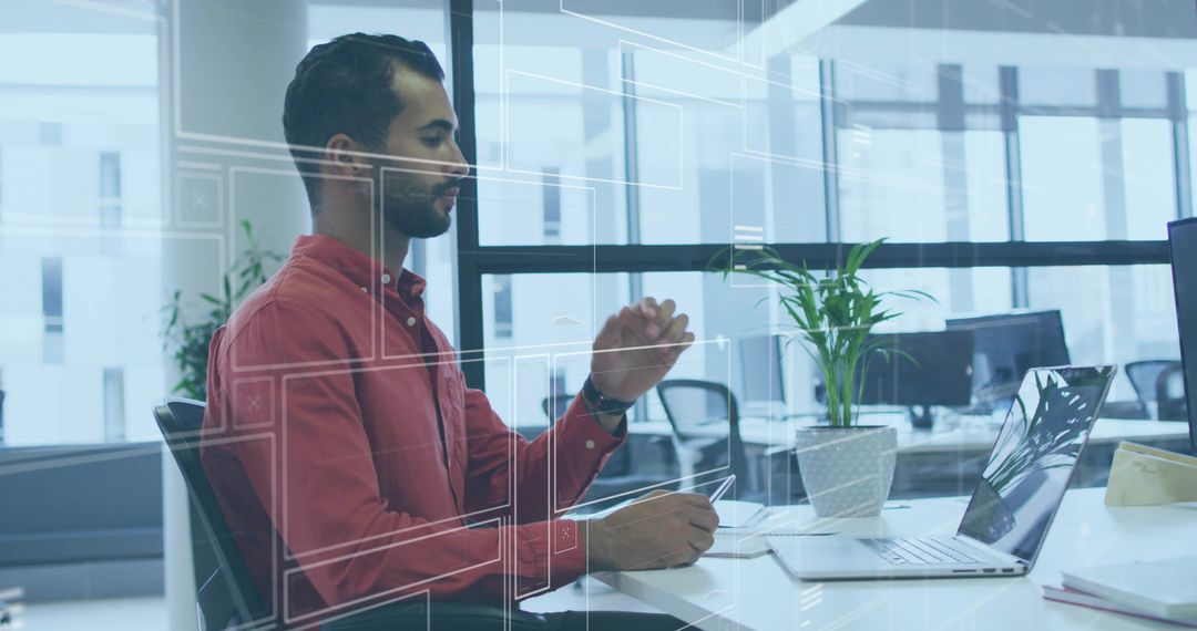 Professional Man Using Stylus to Navigate Digital Interface at Office