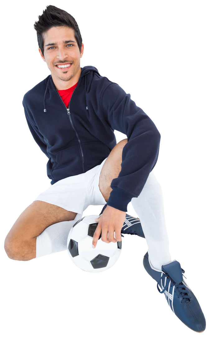 Smiling Football Player Sitting with Soccer Ball on Transparent