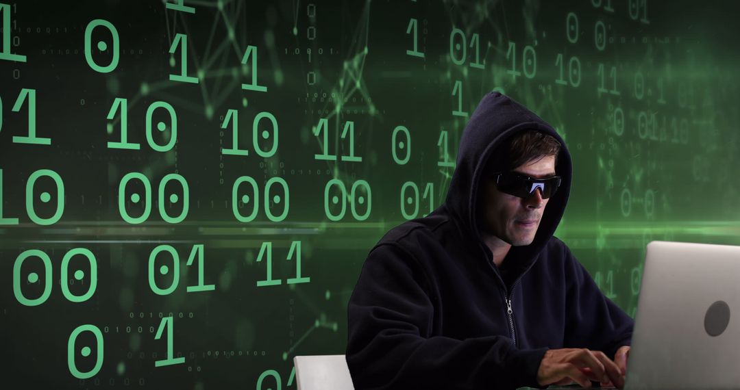 Hacker Typing on Laptop with Binary Code Background - Free Images, Stock Photos and Pictures on Pikwizard.com