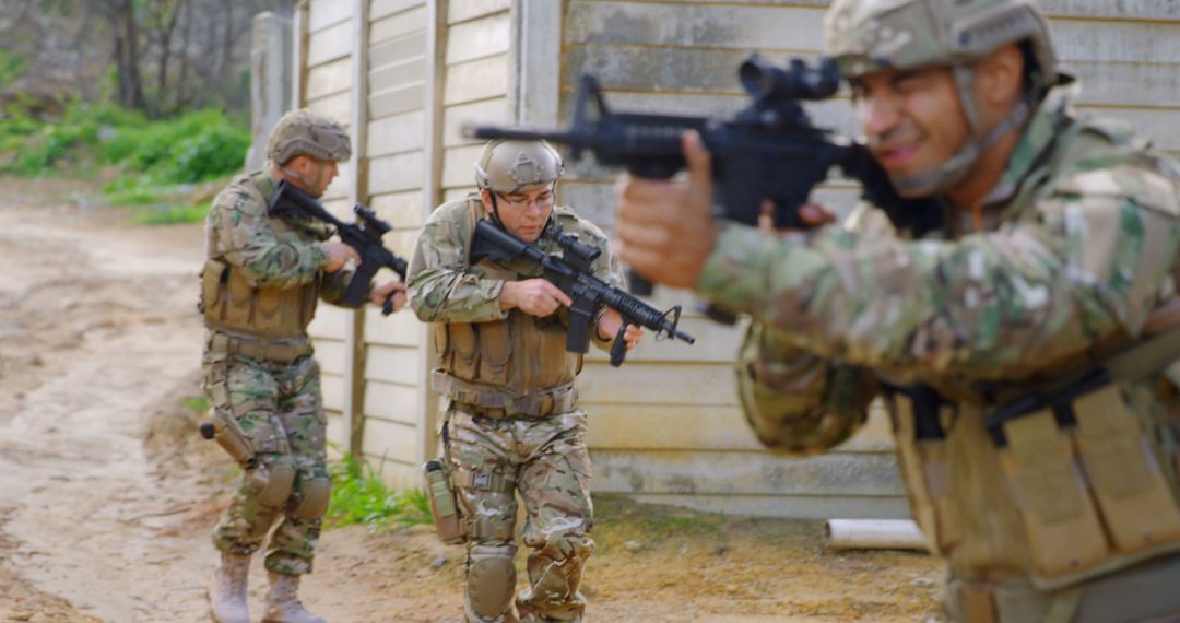 Caucasian Soldiers in Camouflage Engaged in Field Training