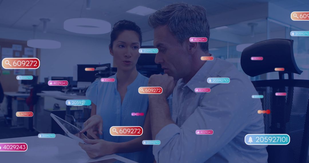 Digital Data Icons Surrounding Business Professionals in Modern Office