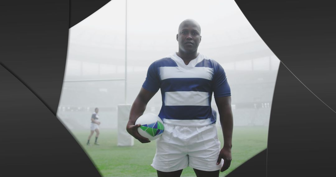 Rugby Player Standing Confidently on Foggy Stadium Field