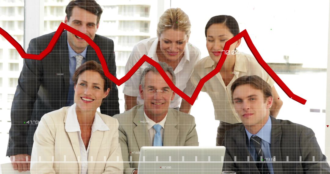 Business team analyzing declining performance on red line graph during strategy meeting