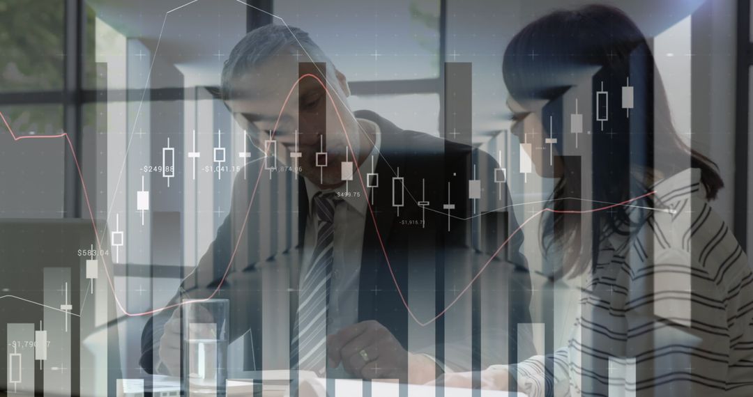 Corporate Professionals Analyzing Financial Data with Graphs Overlay