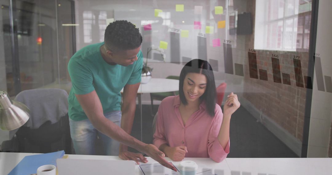 Collaborative Teamwork Session in Modern Office Environment