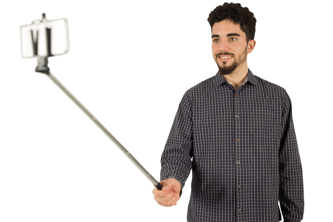 Casual man using selfie stick on transparent background in studio setting - Download Free Stock Images Pikwizard.com