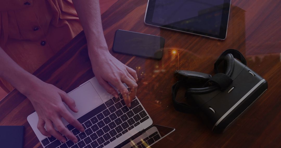 Businesswoman Using Laptop in Office with Digital Technology Items