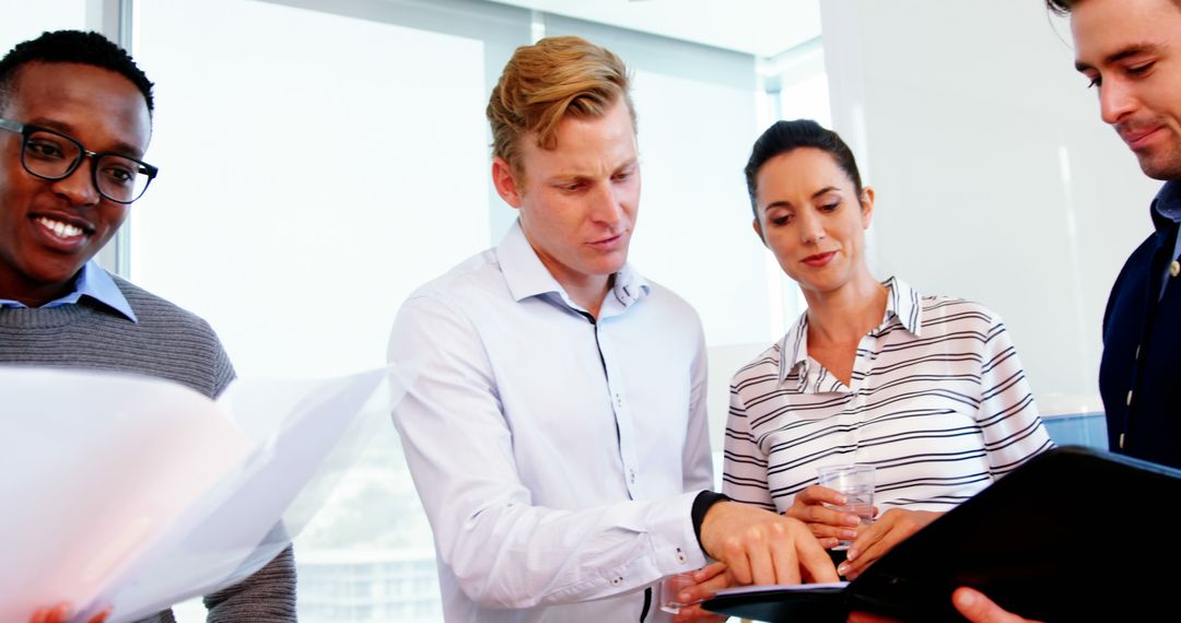 Diverse Professionals Engaged in Business Teamwork Discussion