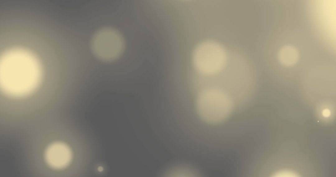 Abstract Glowing Yellow Light Spots on Grey Background
