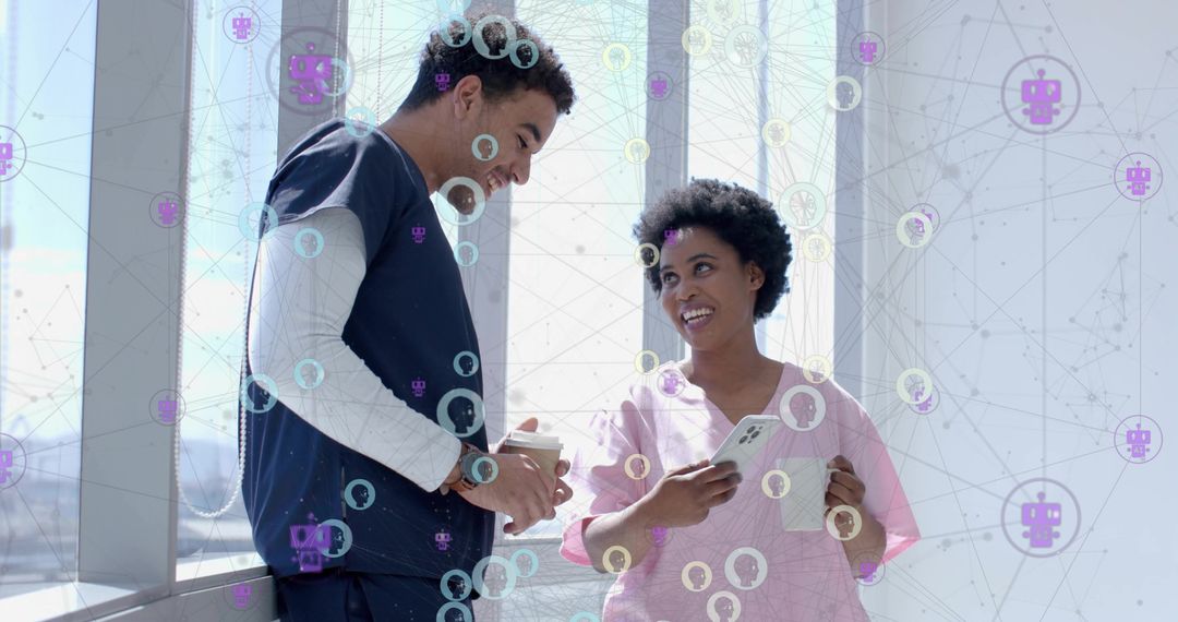 Medical Professionals Discussing Innovations in Hospital Corridor