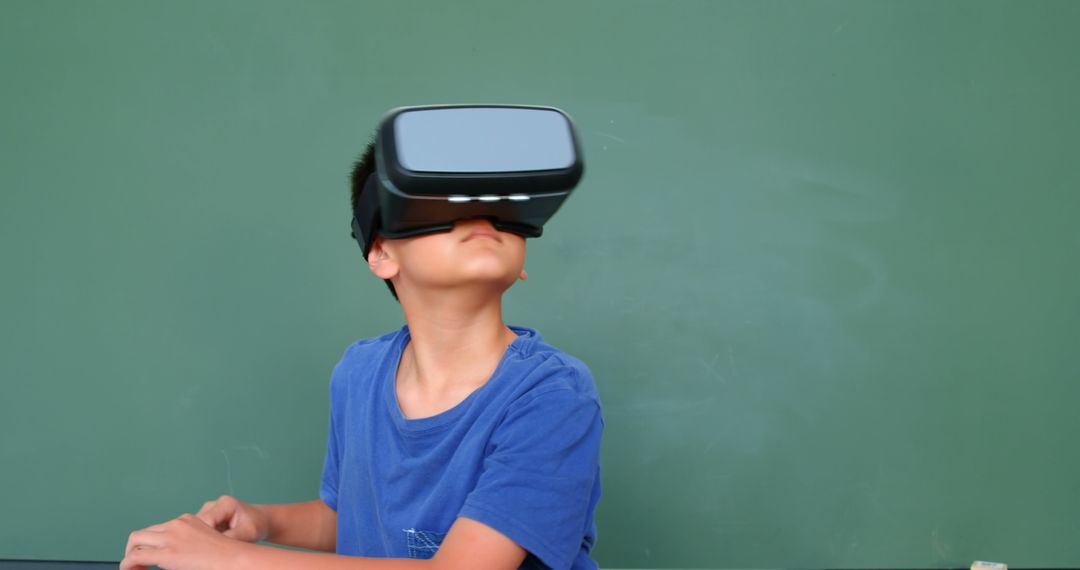 Young Boy Engaging with Virtual Reality in Classroom