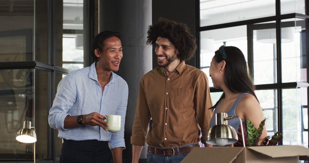 Diverse Business Team Engaging in a Lively Discussion at Modern Office