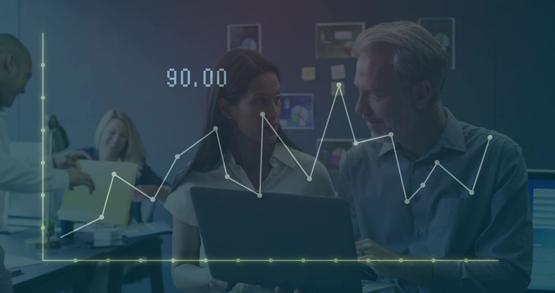 Business Professionals Analyzing Data in Office Environment with Graph Overlay