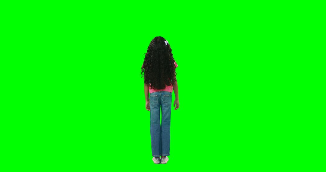 Young girl with long curly hair standing back view green screen - Free Images, Stock Photos and Pictures on Pikwizard.com