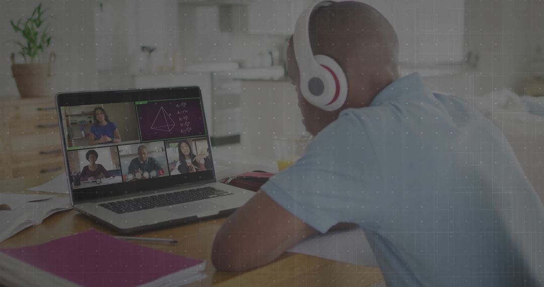 Teen Student Engaging in Online Class from Kitchen