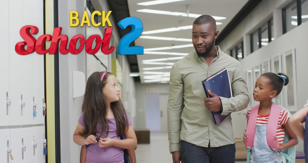 Diverse Teacher and Students Engaging in School Corridor