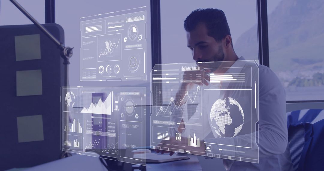 Businessman Analyzing Virtual Data Interfaces in Modern Office