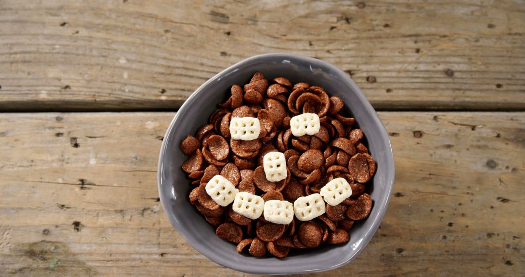 Bowl of Chocolate Cereal with Marshmallows on Rustic Wood Table - Free Images, Stock Photos and Pictures on Pikwizard.com