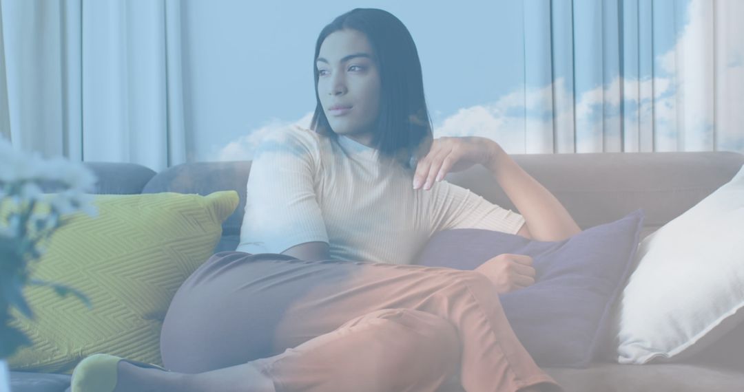 Dreamlike Image of Woman Relaxing on Sofa with Cloud Overlay