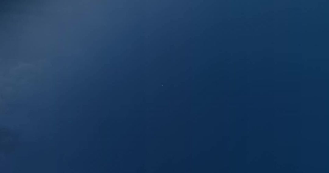 Minimal Light on Deep Blue Background