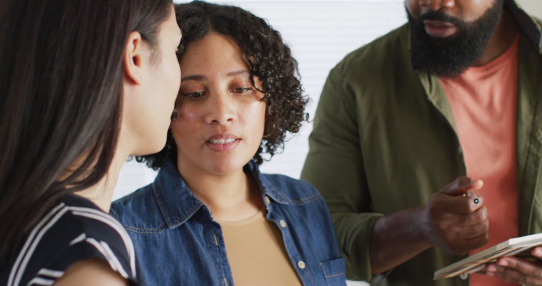 Diverse Colleagues Collaborating in Informal Setting