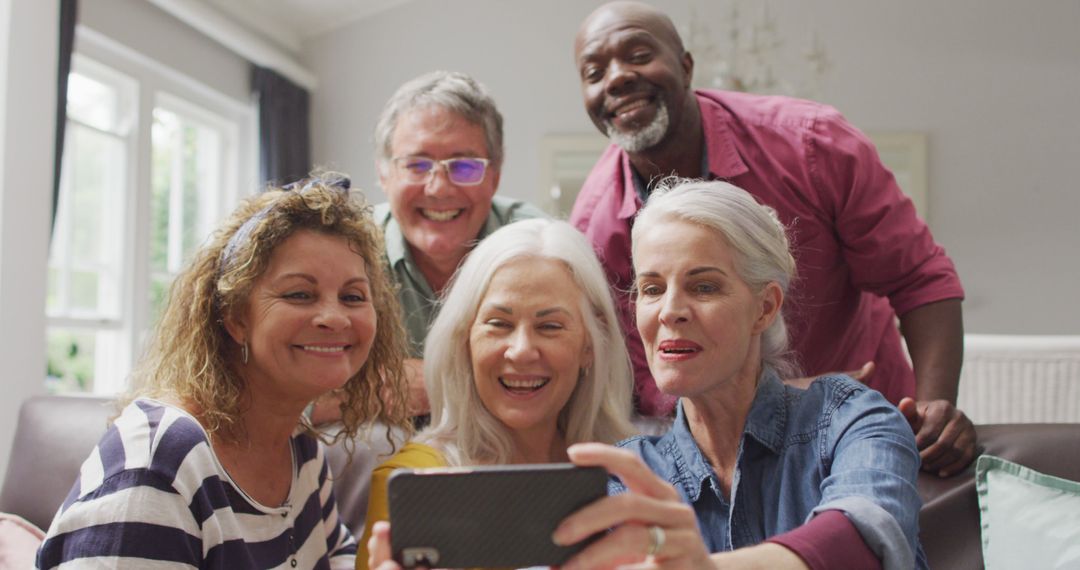 Group of Elderly Friends Taking Selfie Together in Living Room - Free Images, Stock Photos and Pictures on Pikwizard.com